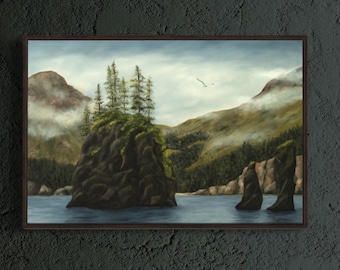 May include: A framed landscape painting depicts a coastal scene with a rocky island topped with trees. Mountains and fog fill the background, with a calm blue sea in the foreground. A bird flies in the sky.