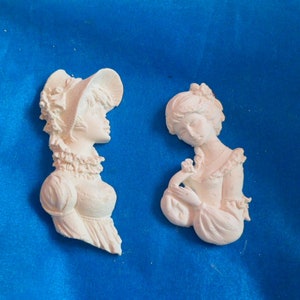 white plaster busts of women shabby chic style in plaster resin 2pcs