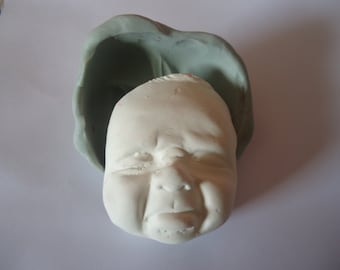 silicone mold pouting child's face for fimo clay wepam;;clay