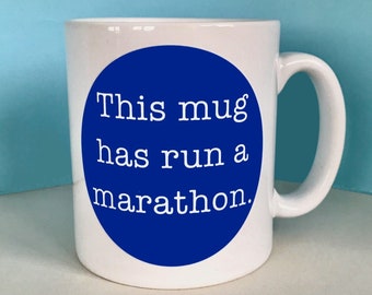 Marathon Congratulations Mug for a Runner – This mug has run a marathon (blue)