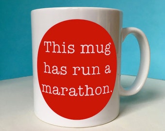 Marathon Congratulations Mug for a Runner – This mug has run a marathon (red)