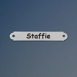 Engraved nickel silver horse saddle nameplate.