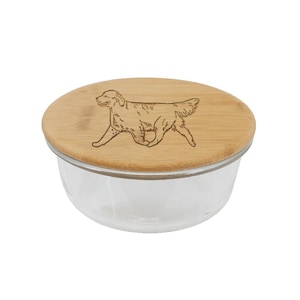 May include: A glass storage container with a bamboo lid. The lid has a laser-engraved design of a golden retriever dog.