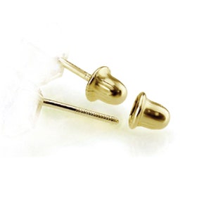 Könnte beinhalten: Ein Paar goldfarbene Ohrring-Rückstecker. Die Rückstecker sind rund und haben eine glatte, polierte Oberfläche.