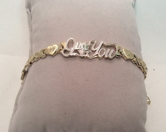 Pulsera de oro amarillo auténtico de 10 quilates para dama, de 7 3/4", con corazones y besos "Te amo" y circonitas cúbicas.