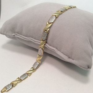 4.90Grams 7 mm 7 1/4&quot; Lady&#39;s 10k Yellow REAL 2 tone Gold XO Hearts and Kisses Bracelet