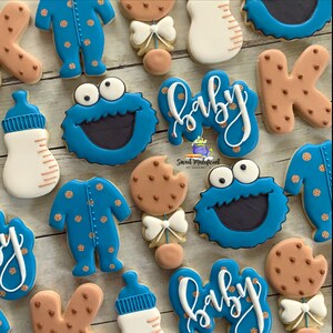 2 Dozen monster baby shower cookies