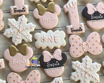 2 dozen onederland Minnie Mouse sugar cookies . Minnie Mouse cookie favors .