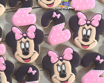 2 dozen Minnie Mouse sugar cookies . Minnie Mouse cookie favors .