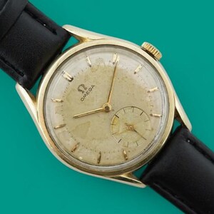 Vintage herenhorloge uit de jaren 60, Omega kaliber 267, vergulde kast, ref. 2891-1, handopwinding, onderhoud uitgevoerd.