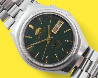 Vintage automatic Japan watch ORIENT 3 star 21 jewels mechanical wristwatch, stainless steel case, green dial