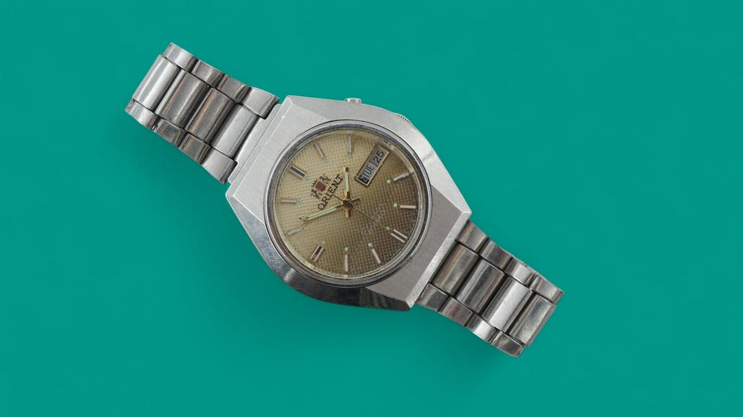 ヴィンテージ自動巻き日本製腕時計 ORIENT 3スター 4697964-6D 21石