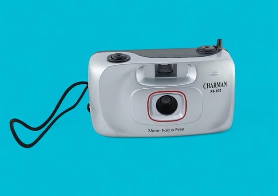 Charman M-102 35mm focus free, manual compact camera
