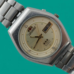 Vintage automatic Japan watch ORIENT 3 star 21 jewels mechanical wristwatch, stainless steel case, silver dial