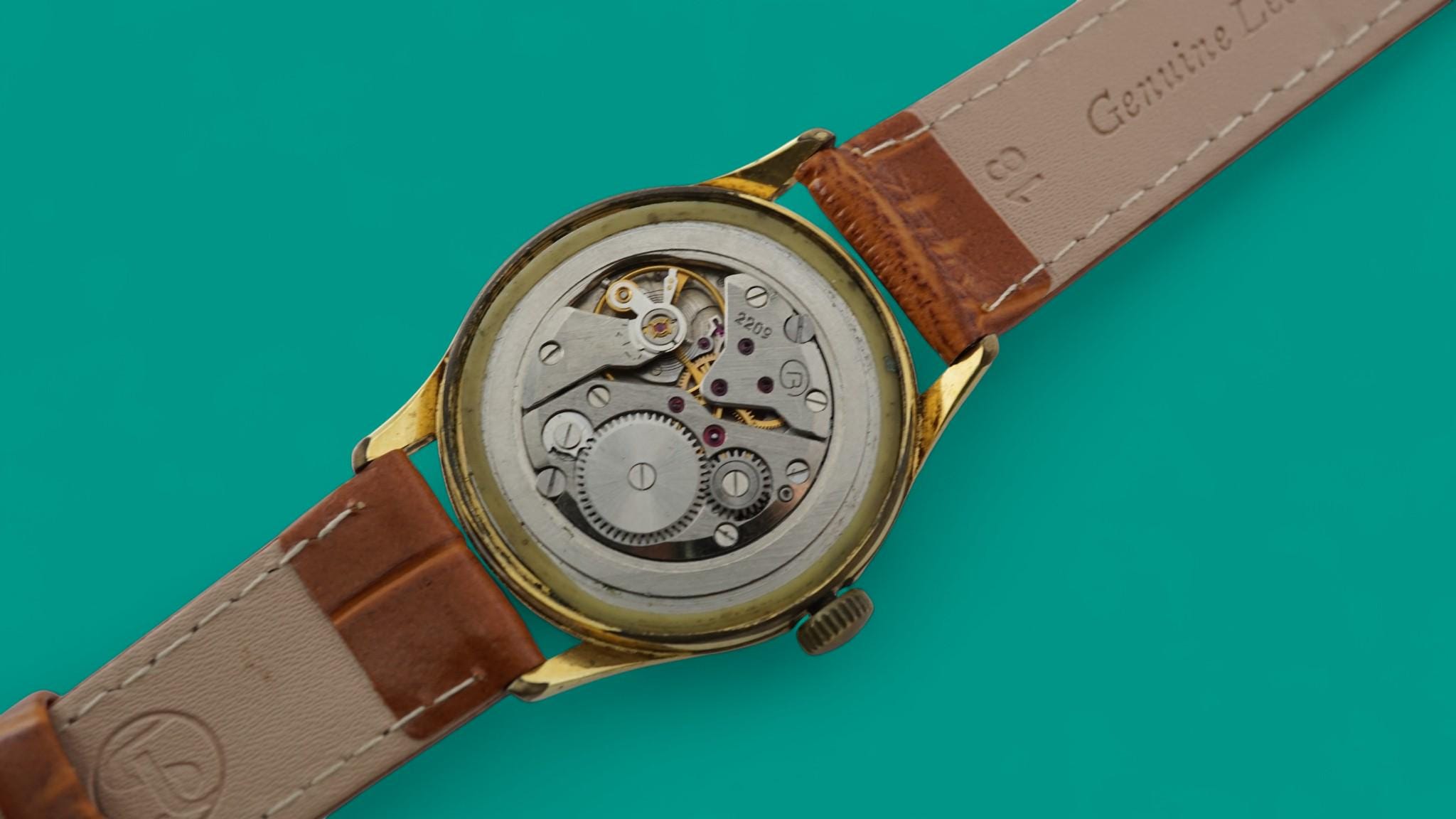 ヴィンテージ ボストーク ソビエト機械式メンズ腕時計、コレクターズ腕時計 cal.2209、金メッキケース