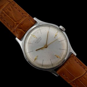 Orologio meccanico sovietico vintage Vostok cassa in acciaio 2209 URSS 18J Vostok da uomo