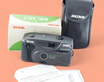 Oude voorraad Skina SK 107 compactcamera 35 mm film vintage camera, in doos, inclusief batterij
