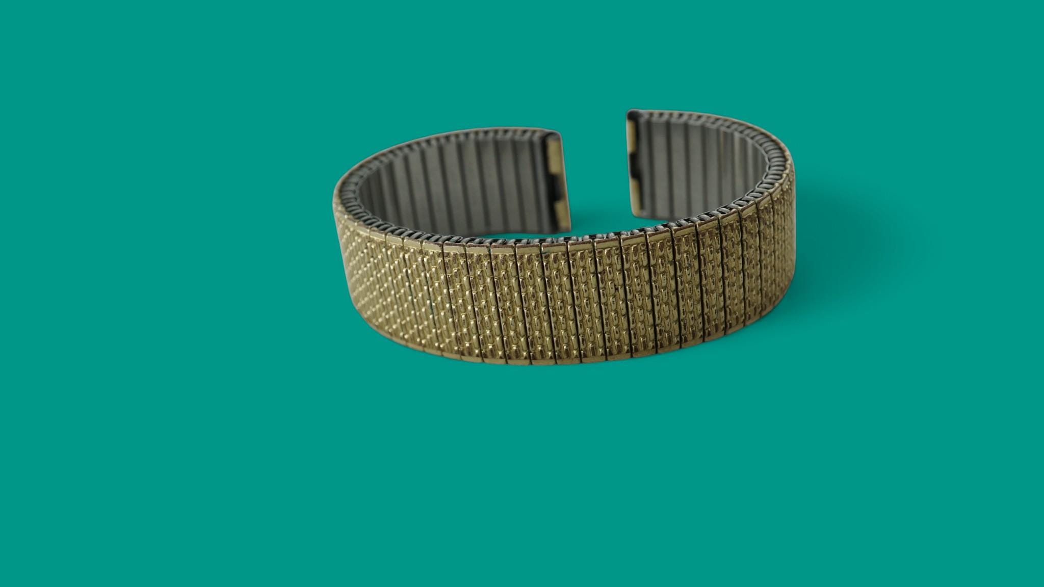 Bracelet de montre extensible Fixo-Flex doré en acier inoxydable vintage des années 60 et 70 - France