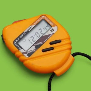 Vintage LCD digital pocket watch stopwatch INTEGRAL ChSE-01 Belarus, electronica with signal