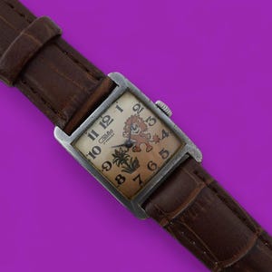 Vintage damklocka SLAVA kal. 1601 mekanisk armbandsur med 17 juveler Sovjetunionen Funny Lion