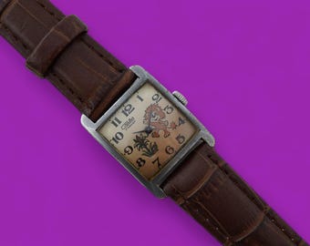 Vintage women's dress watch SLAVA cal.1601 17 jewels mechanical wristwatch USSR Funny Lion