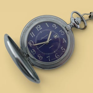Vintage quartz soviet mechanical pocket watch MOLNIJA cal.P2460, blue dial