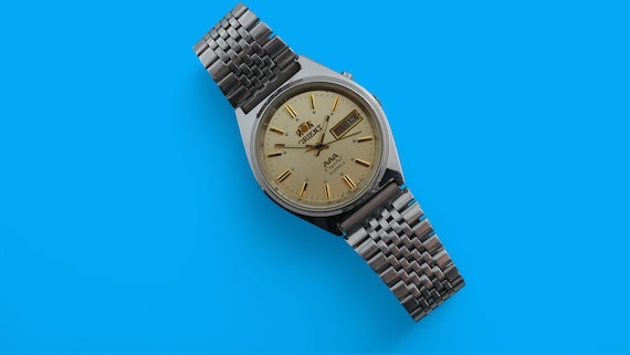 ヴィンテージ自動巻き日本製腕時計 ORIENT クリスタル 3 スター 21 石