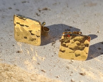 18k gold earrings.