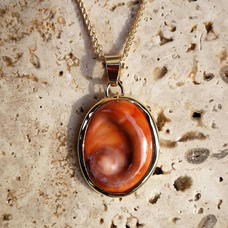 lucky charm of the Mediterranean. Pendant 18 K Gold eye of Saint Lucia