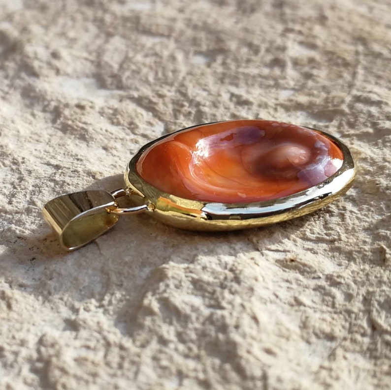 lucky charm of the Mediterranean. Pendant 18 K Gold eye of Saint Lucia