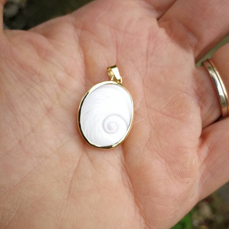 lucky charm of the Mediterranean. Pendant 18 K Gold eye of Saint Lucia