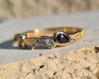 Ready to ship, modern stacking ring in 18K yellow, white and red gold, a sapphire and a diamond.