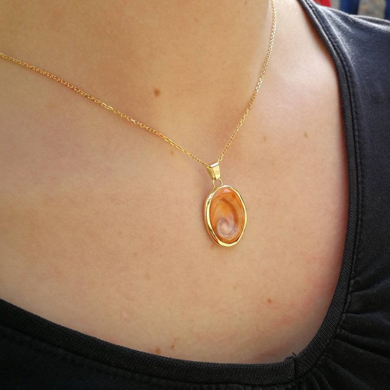 lucky charm of the Mediterranean. Pendant 18 K Gold eye of Saint Lucia