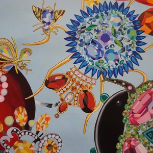 May include: A blue background with a variety of colourful jeweled insects and flowers. The insects are made of gold, silver, and jewels. The flowers are made of jewels and have a variety of colours.