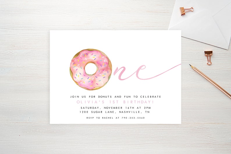 May include: Pink and white donut with sprinkles, a pink cursive "one" and text that reads "Join us for donuts and fun to celebrate Olivia's 1st birthday! Saturday, November 16th at 2pm 1200 Sugar Lane, Nashville, TN RSVP to Rachel at 790-353-5560"