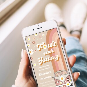 May include: A digital invitation for a 4th birthday party with a retro 70s theme. The invitation features a colorful rainbow, daisies, and the text "Four ever Young". The invitation also includes a vintage VW bus with daisies on it.