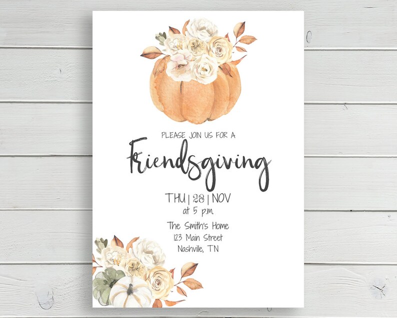 May include: A white card with a watercolor illustration of a pumpkin with fall flowers. The text on the card reads "PLEASE JOIN US FOR A Friendsgiving THU | 28 | NOV at 5 p.m The Smith's Home 123 Main Street Nashville, TN"