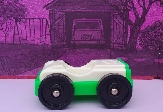 fisher price flintstone car