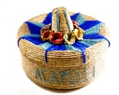 Vintage Mexican Basket from Acapulco With Sombrero Lid Tight Weave With Yarn Starburst Pattern and Rattan Flowers. 8 quot Round Indented Body