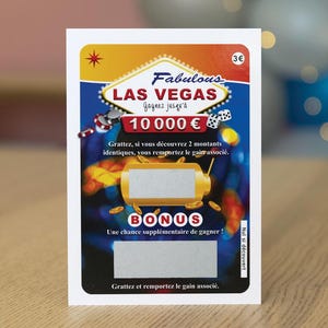 Peut inclure: Un ticket de grattage rectangulaire sur le th&egrave;me de Las Vegas avec le texte Fabulous LAS VEGAS, 10 000 &euro; et BONUS. La carte comporte deux zones &agrave; gratter argent&eacute;es, des illustrations de jetons de casino, de d&eacute;s et des instructions en fran&ccedil;ais.
