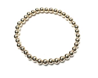 solid 14k yellow gold beads bracelet