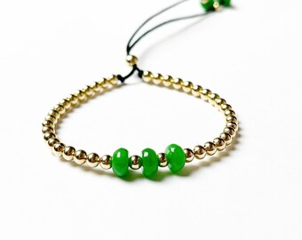 solid 14k yellow gold beads and jade bracelet