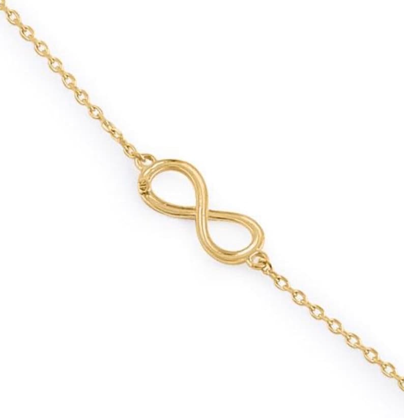 14k yellow gold infinity charm bracelet