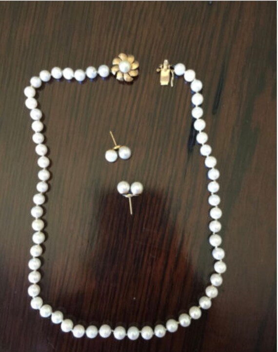 pearl necklace and matching earrings