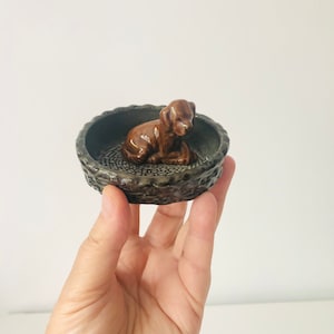 Wade England ceramic dog in a basket