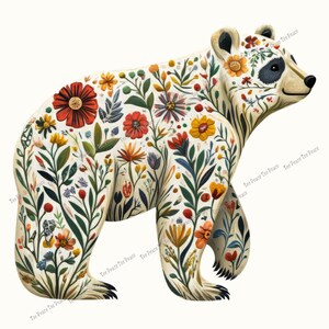 May include: A whimsical illustration of a bear covered in colorful flowers and foliage. The bear is depicted in a walking pose, with a cream-colored body and a black patch around its eye. The flowers are in shades of red, yellow, orange, and blue.