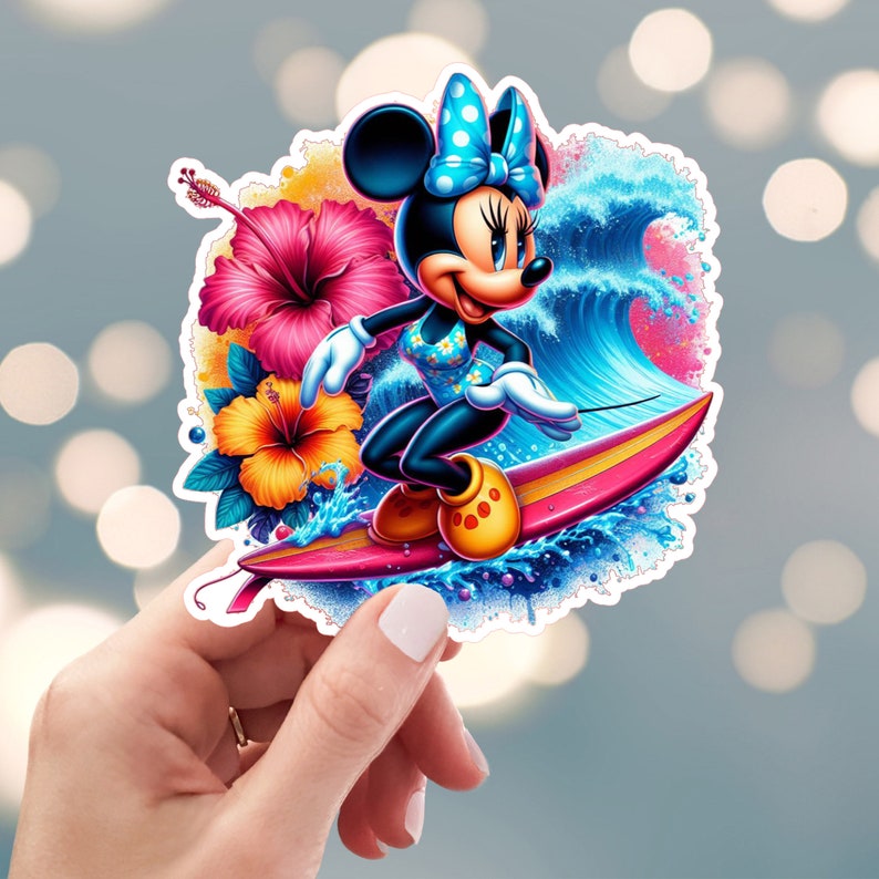 May include: A colorful sticker featuring a cartoon mouse character riding a surfboard on a wave. The mouse is wearing a blue swimsuit and a blue and white polka dot bow. The background is a vibrant blue and pink with tropical flowers.