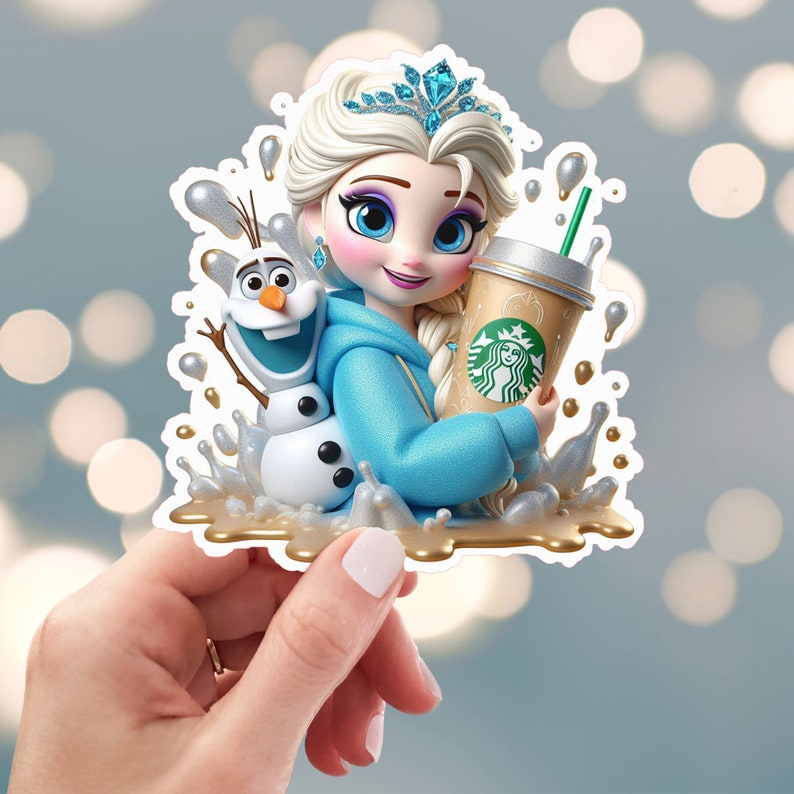 May include: A sticker featuring a cartoon illustration of Elsa from Frozen holding a Starbucks coffee cup.  Elsa is wearing a blue hoodie and a crown.  Olaf is standing behind her.  The sticker is surrounded by a gold liquid splash.