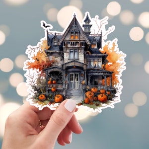 May include: A spooky, multi-story, gray house with a porch and a front door. The house is surrounded by fall foliage and pumpkins.