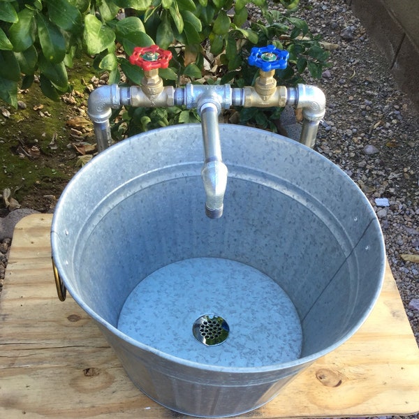 Industrial faucet with round galvanized tub for sink